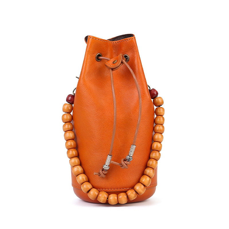 Vintage Vegetable Tanned Leather Bucket Bag orange front view