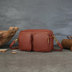 Single Vegetable Tanned Leather Crossbody Bag gray angled view