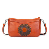 Grain Vegetable Tanned Leather Crossbody Bag orange front view
