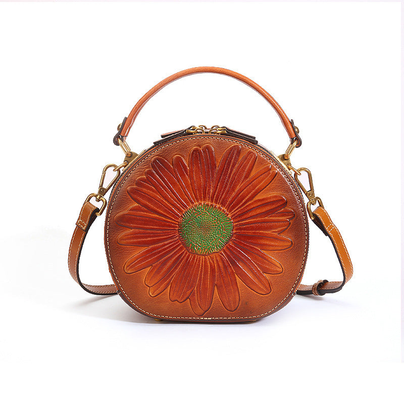 Round Vegetable Tanned Leather Crossbody Bag orange front view