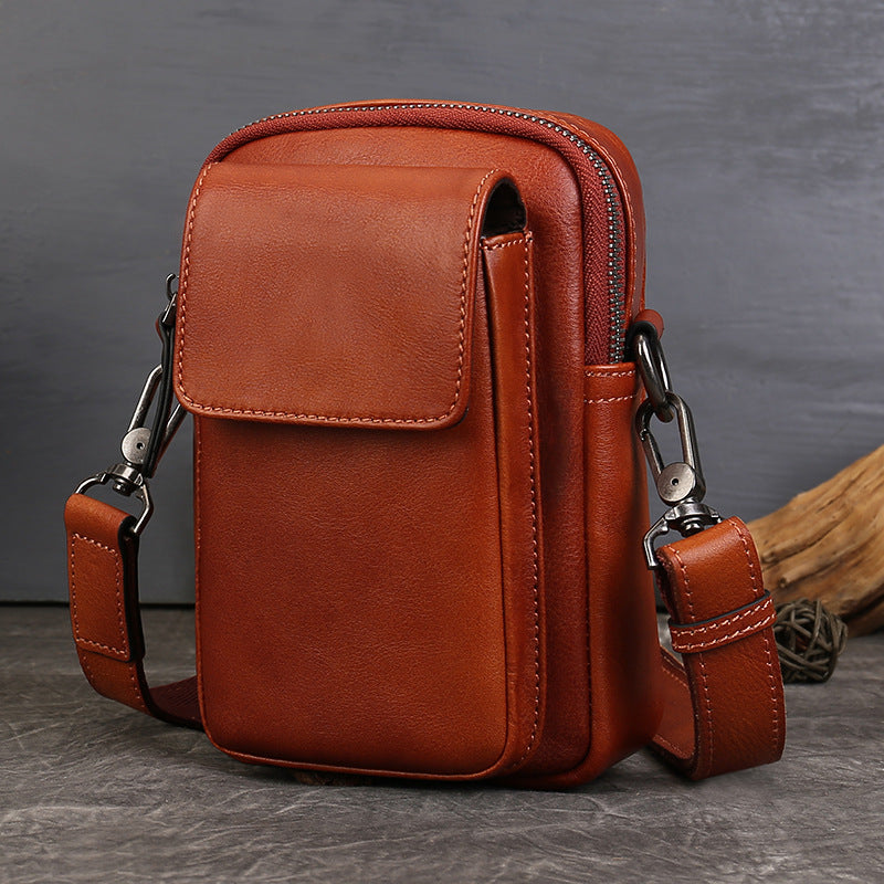 Phone Vegetable Tanned Leather Crossbody Bag brown angled view