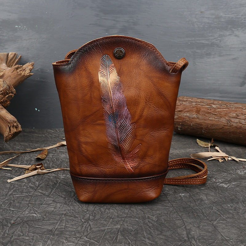 Bucket Vegetable Tanned Leather Crossbody Bag brown lifestyle view