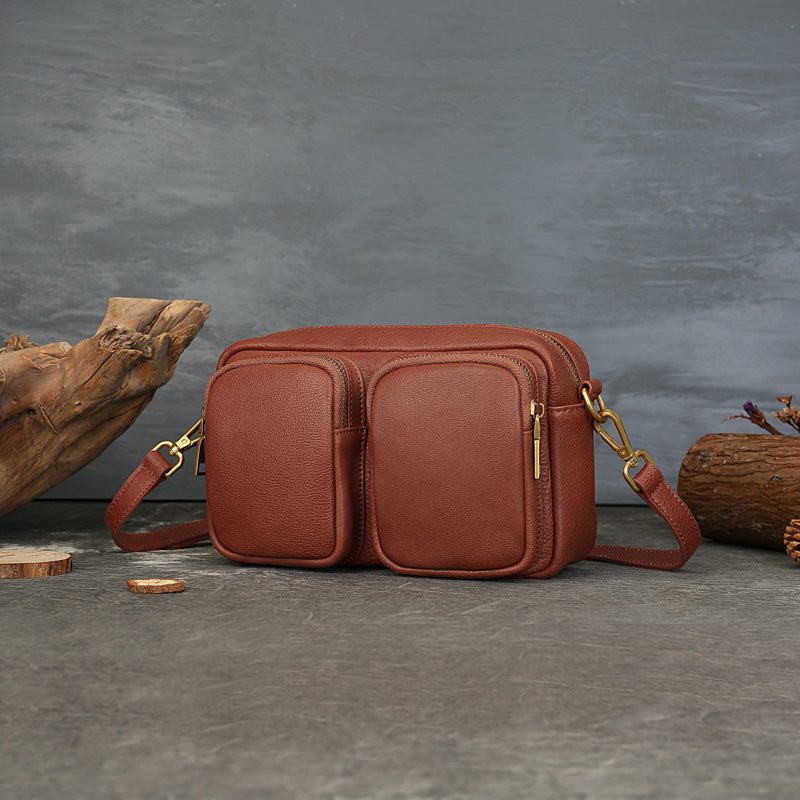 Single Vegetable Tanned Leather Crossbody Bag gray angled view