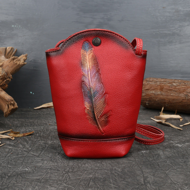 Bucket Vegetable Tanned Leather Crossbody Bag brown angled view