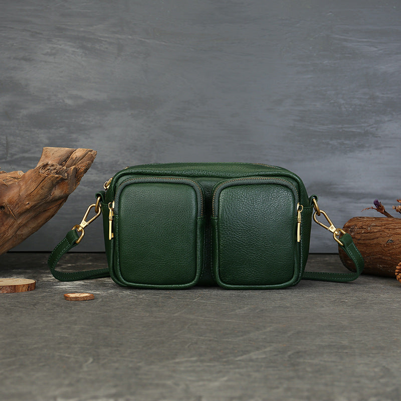 Single Vegetable Tanned Leather Crossbody Bag gray texture closeup